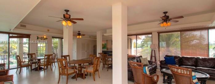 96000 Overseas Highway, Unit L5 Key Largo, FL 33037 - Photo 55 of 55 a view of a livingroom with furniture and a chandelier