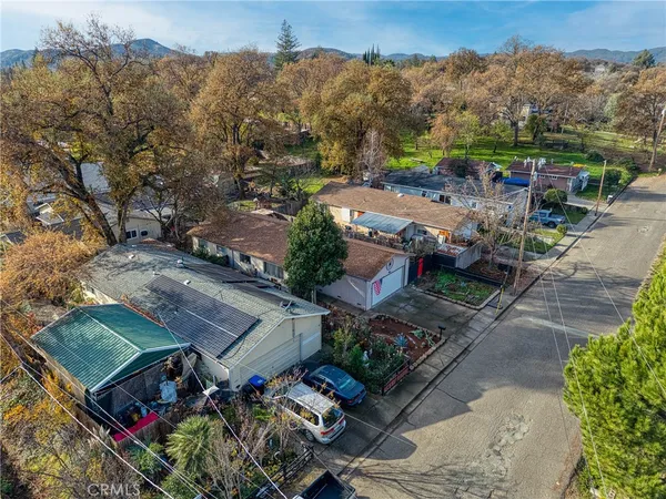 an aerial view of a house with a garden