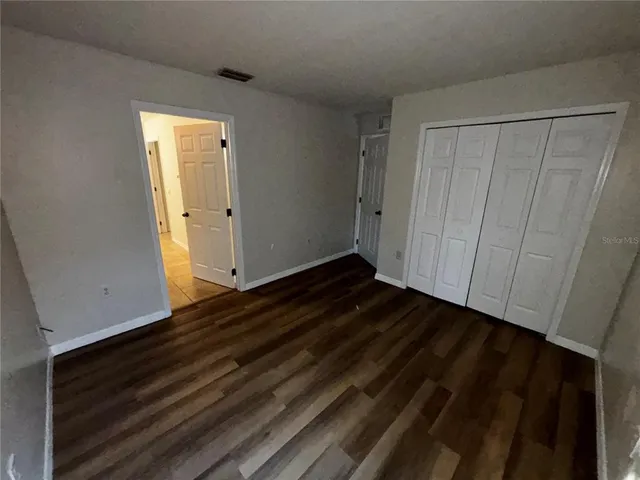 a view of an empty walk in closet