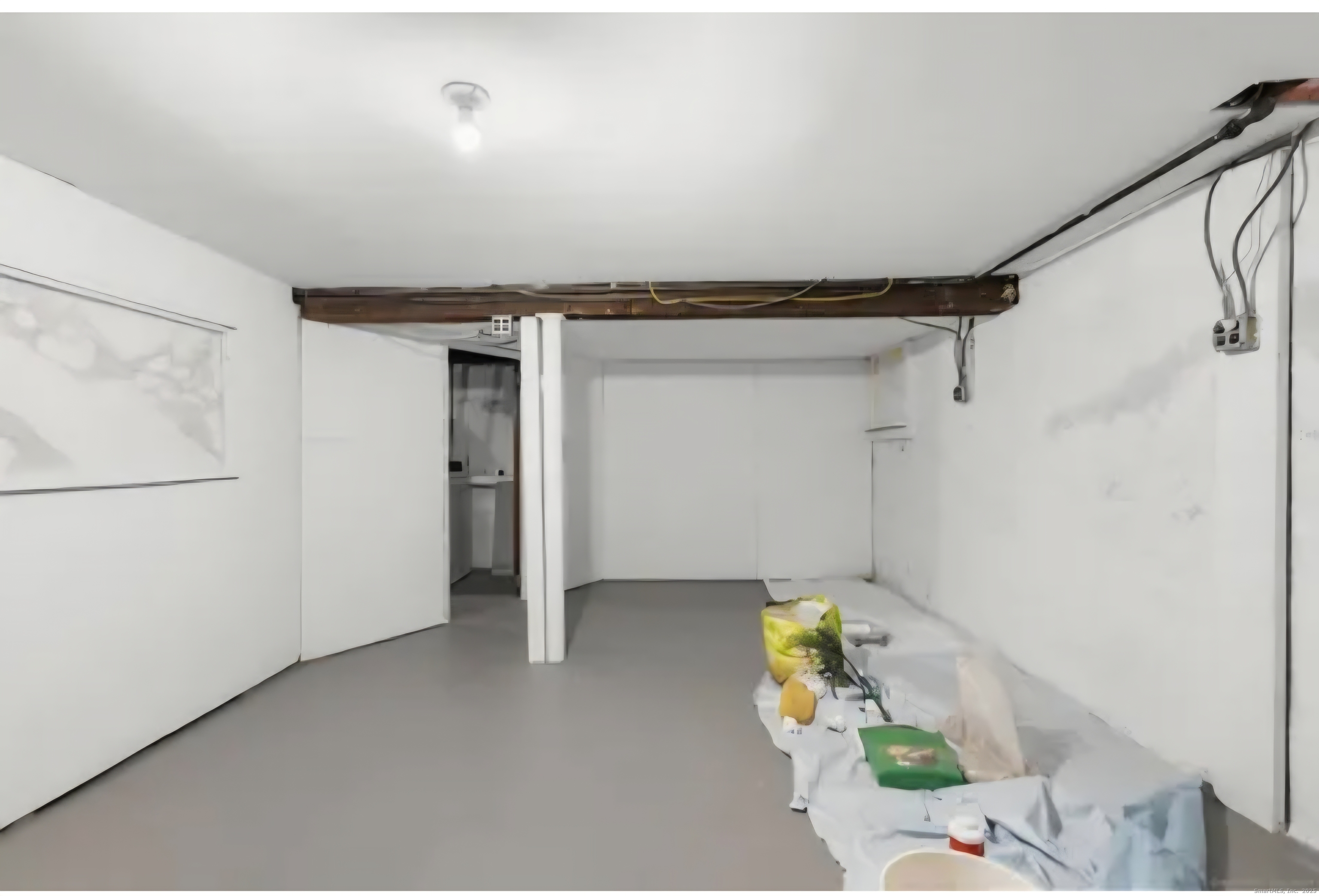 1276 North Avenue Stratford, CT 06614 - Photo 9 of 10 a view of storage and utility room with a hallway