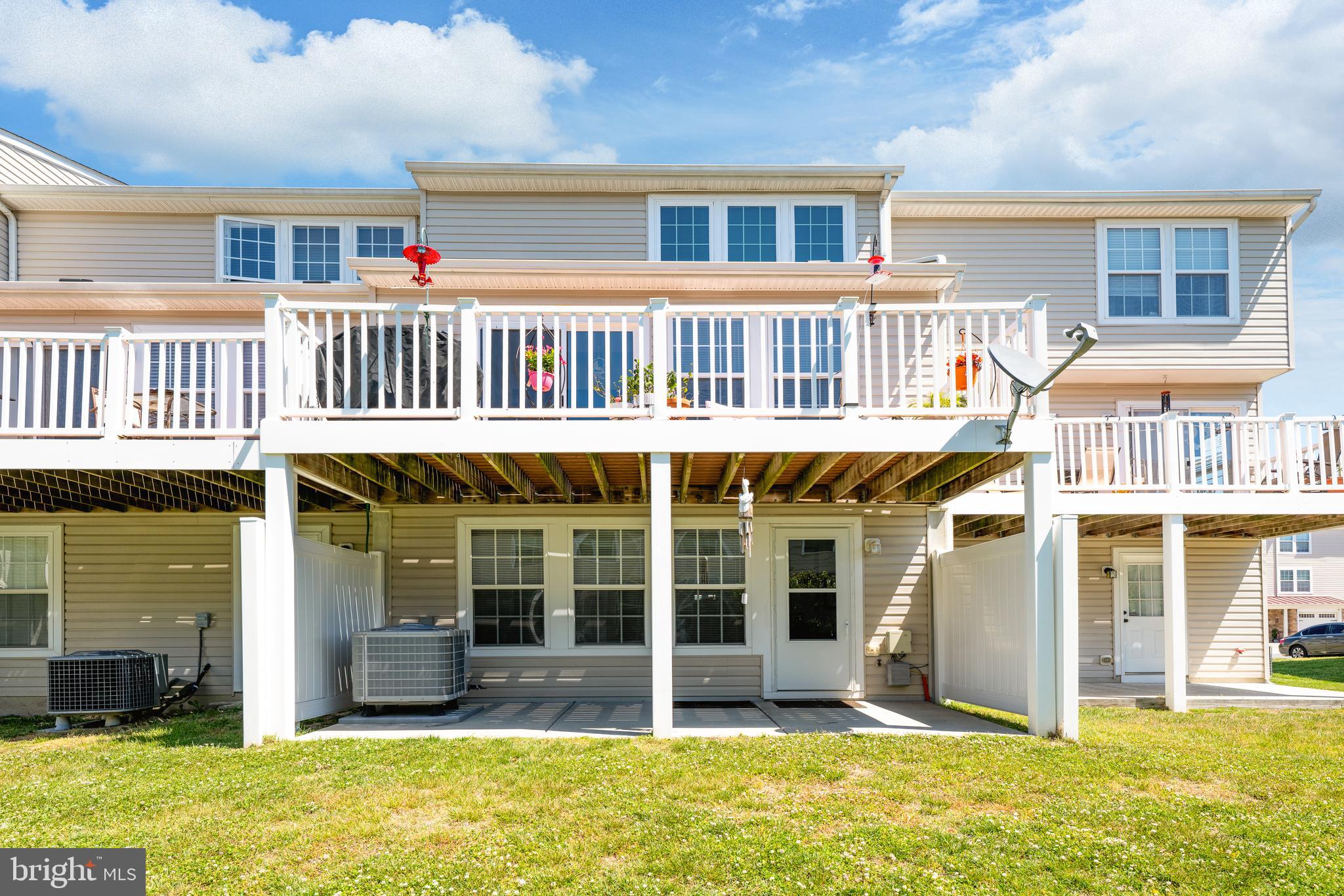 27548 Mayfield Road, Unit 42 Millsboro, DE 19966 - Photo 41 of 46 a front view of a house with a yard balcony