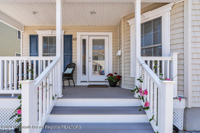 63 Fort Avenue Seaside Heights, NJ 08751 - Photo 3 of 53 a view of staircase with wooden floor and stairs
