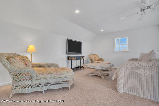 63 Fort Avenue Seaside Heights, NJ 08751 - Photo 35 of 53 a bedroom with a bed and a flat screen tv