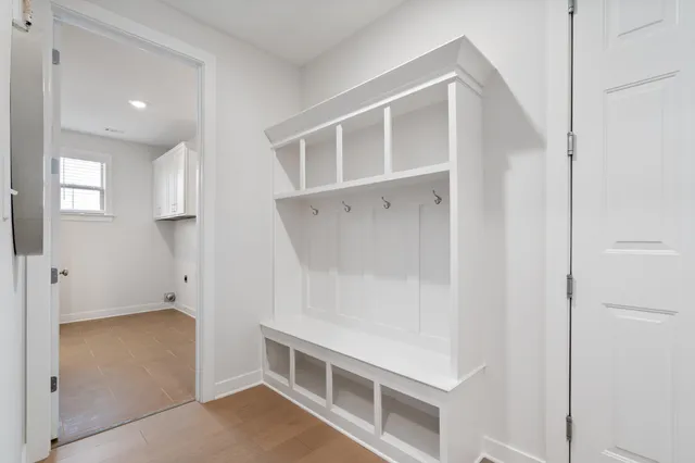a view of an empty room with closet