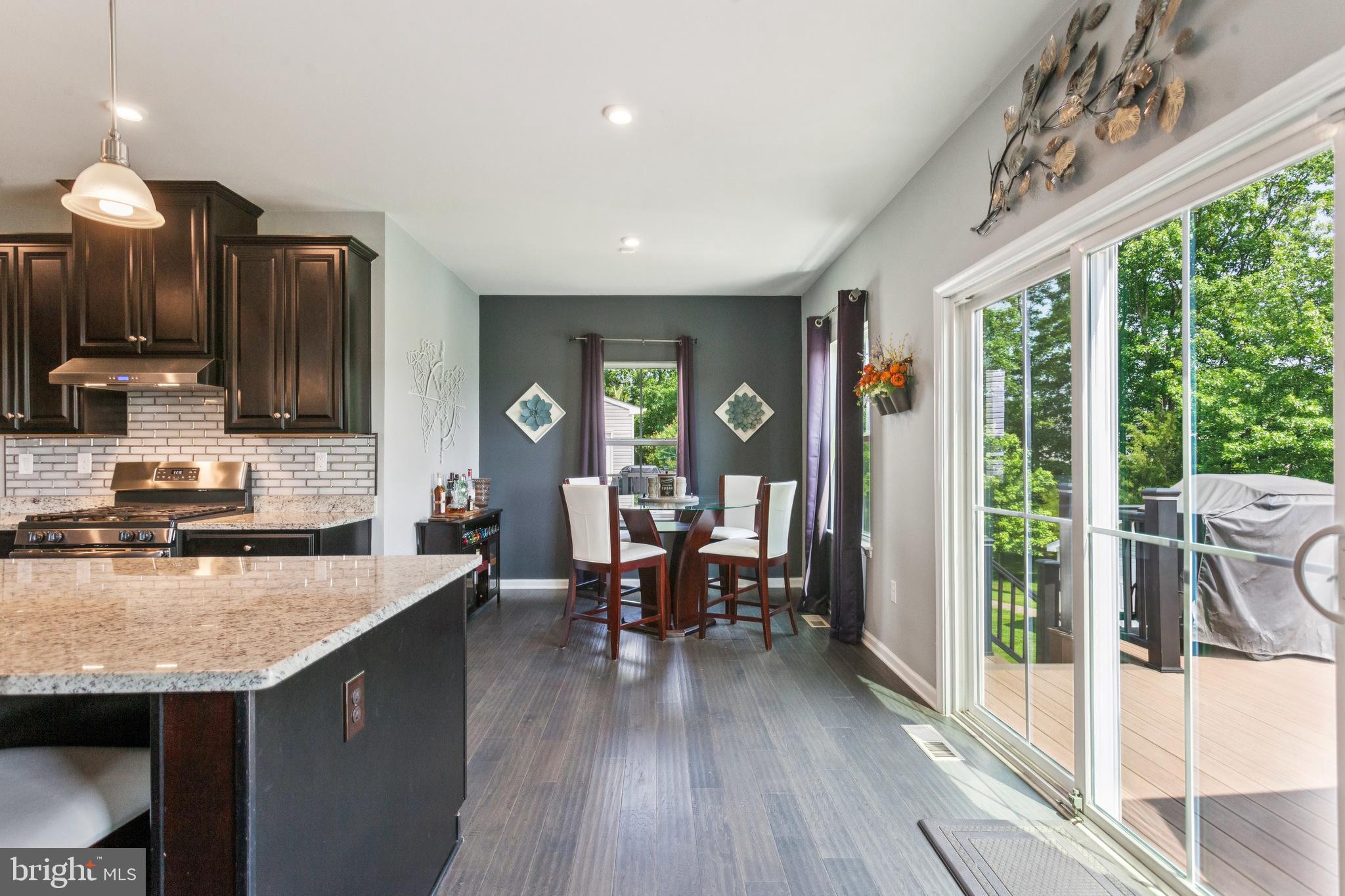 126 Pixie Moss Road Pottstown, PA 19464 - Photo 11 of 29 Breakfast nook with sliders to deck