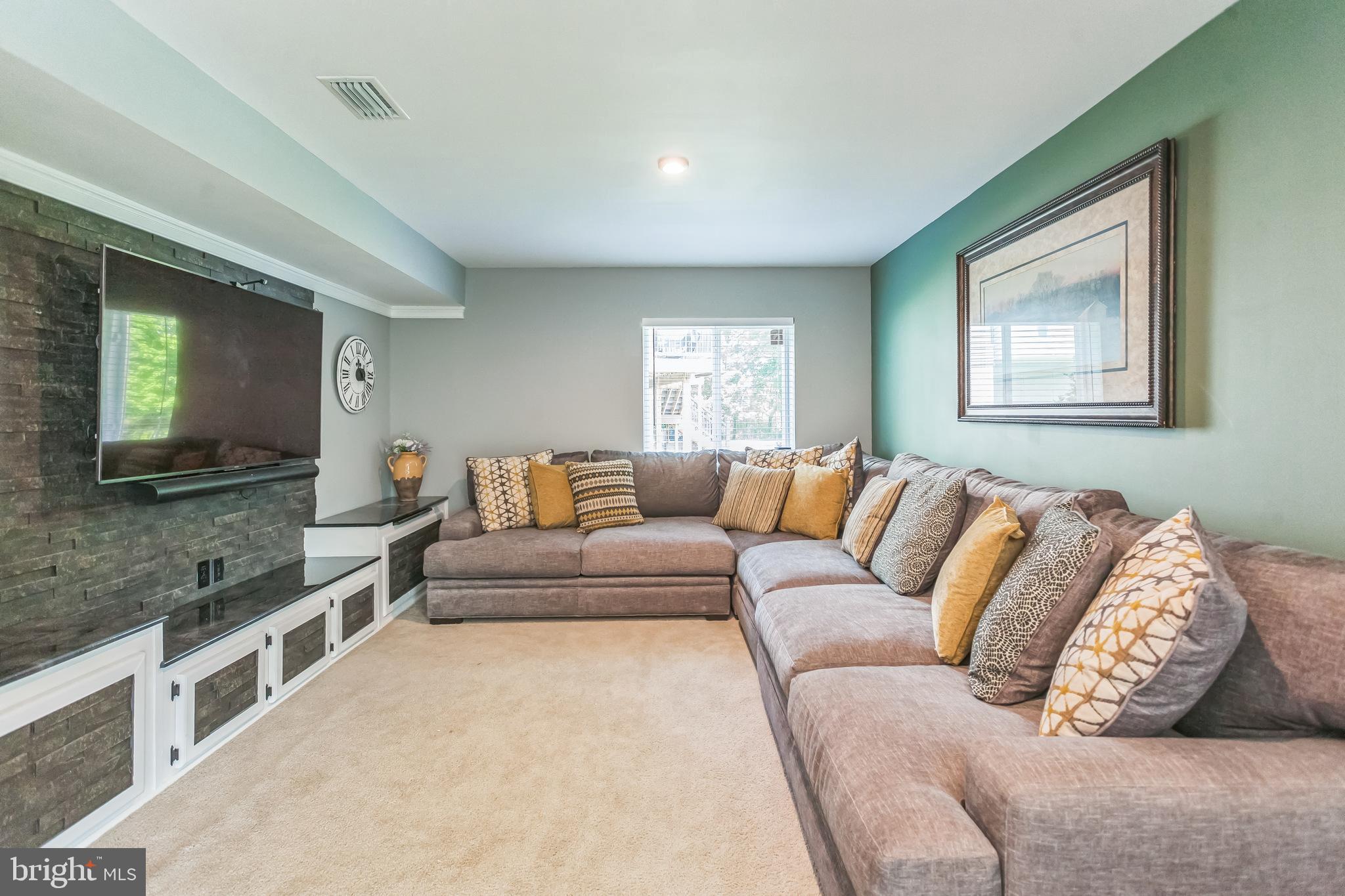 126 Pixie Moss Road Pottstown, PA 19464 - Photo 22 of 29 Finished basement with built in cabinet