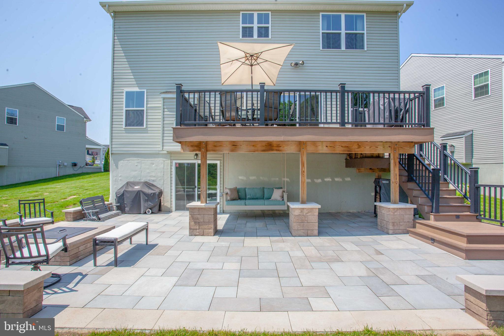 126 Pixie Moss Road Pottstown, PA 19464 - Photo 25 of 29 Back blue stone patio and deck
