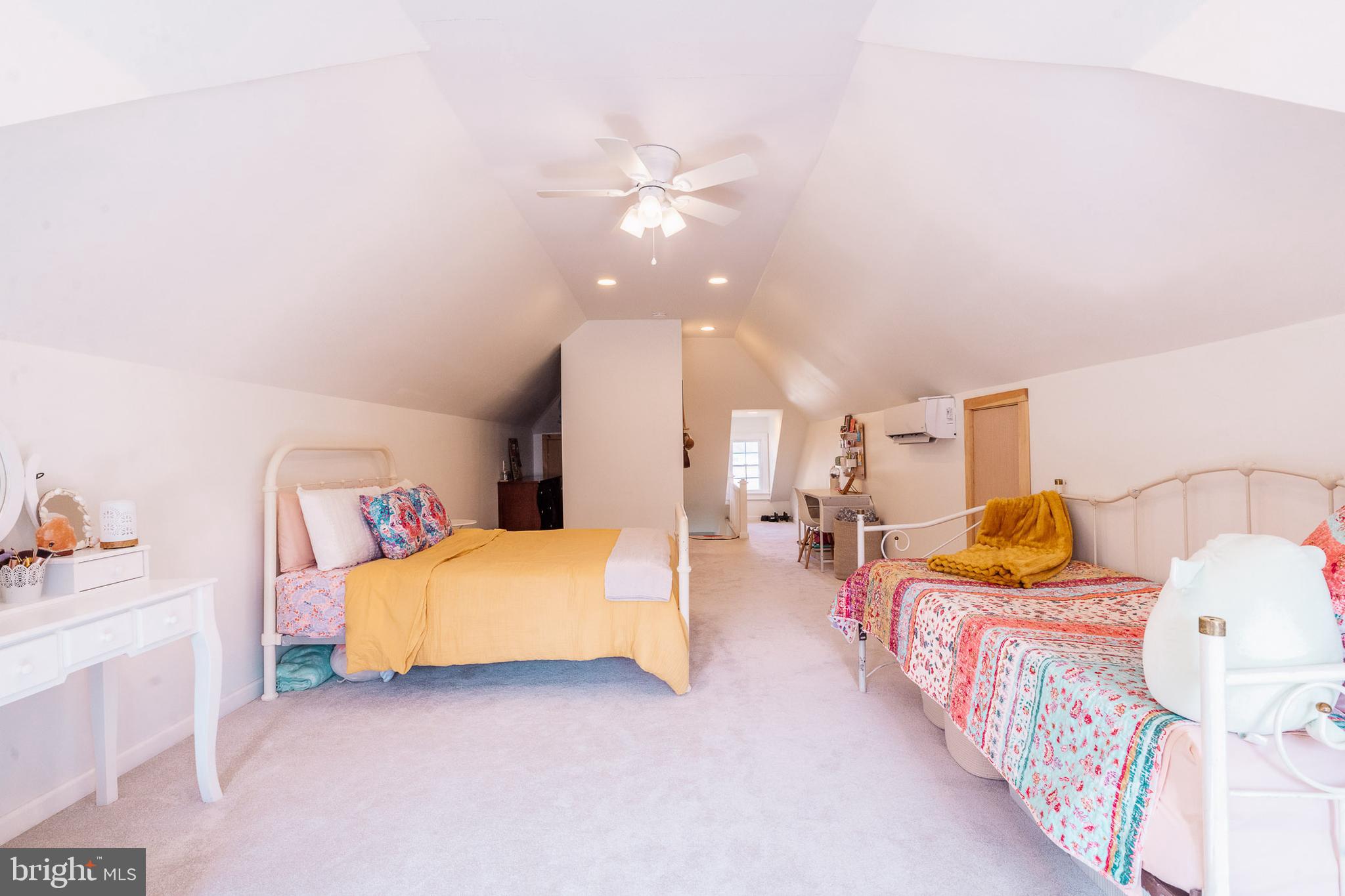 27209 Saxis Road Temperanceville, VA 23442 - Photo 29 of 31 a bedroom with furniture and a couch