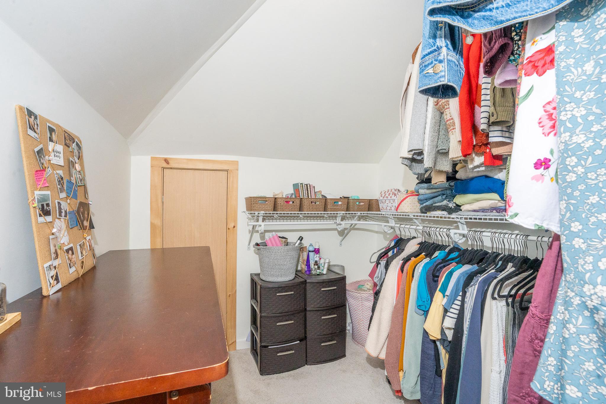 27209 Saxis Road Temperanceville, VA 23442 - Photo 31 of 31 a view of walk in closet with clothes and shoes