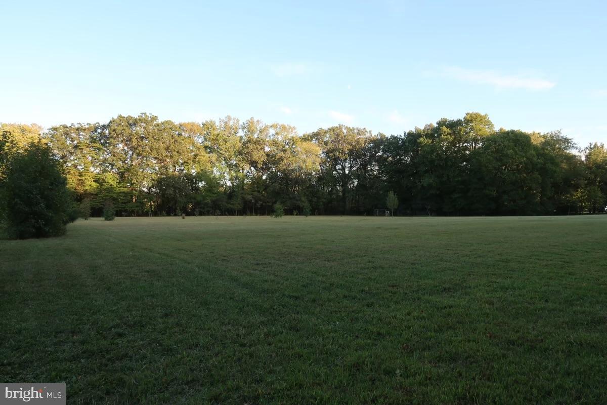 27209 Saxis Road Temperanceville, VA 23442 - Photo 7 of 31 a view of outdoor space and yard