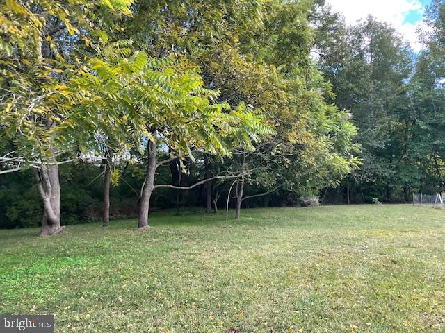 27209 Saxis Road Temperanceville, VA 23442 - Photo 9 of 31 a view of outdoor space with deck and outdoor space