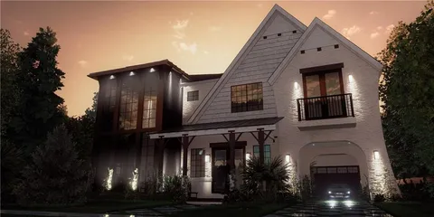 a front view of a house with yard