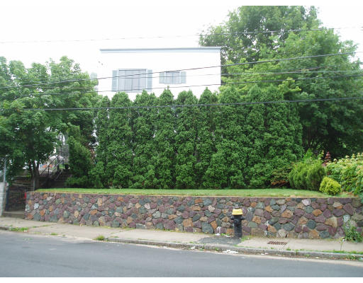 26 Crestway Road Boston, MA 02128 - Photo 1 of 1 front view of a house with a yard