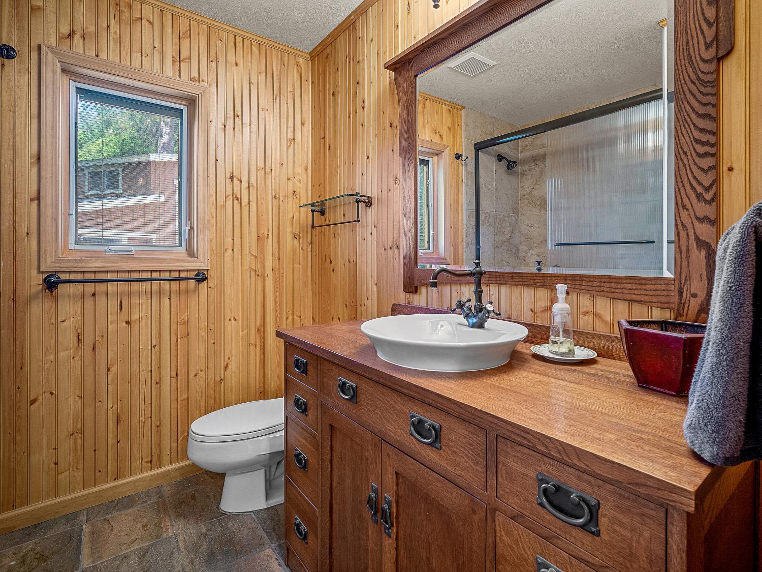 6460 Claim Street Placerville, CA 95667 - Photo 32 of 86 a bathroom with a granite countertop sink toilet and shower