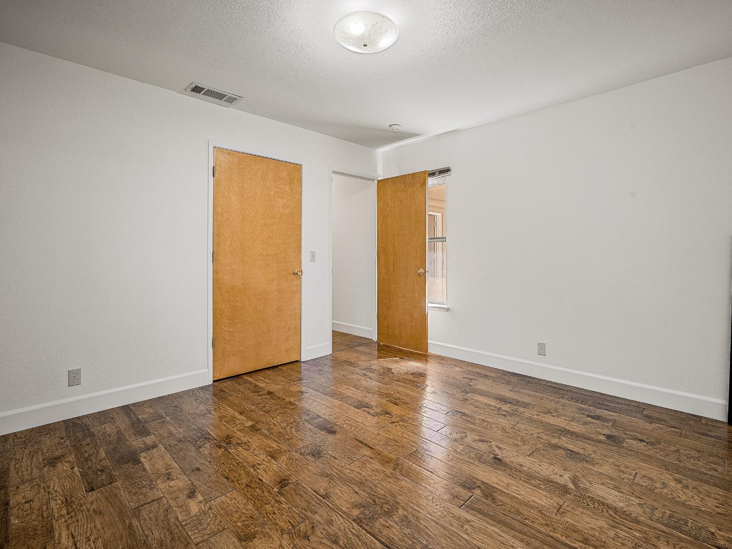 6460 Claim Street Placerville, CA 95667 - Photo 38 of 86 a view of an empty room with wooden floor