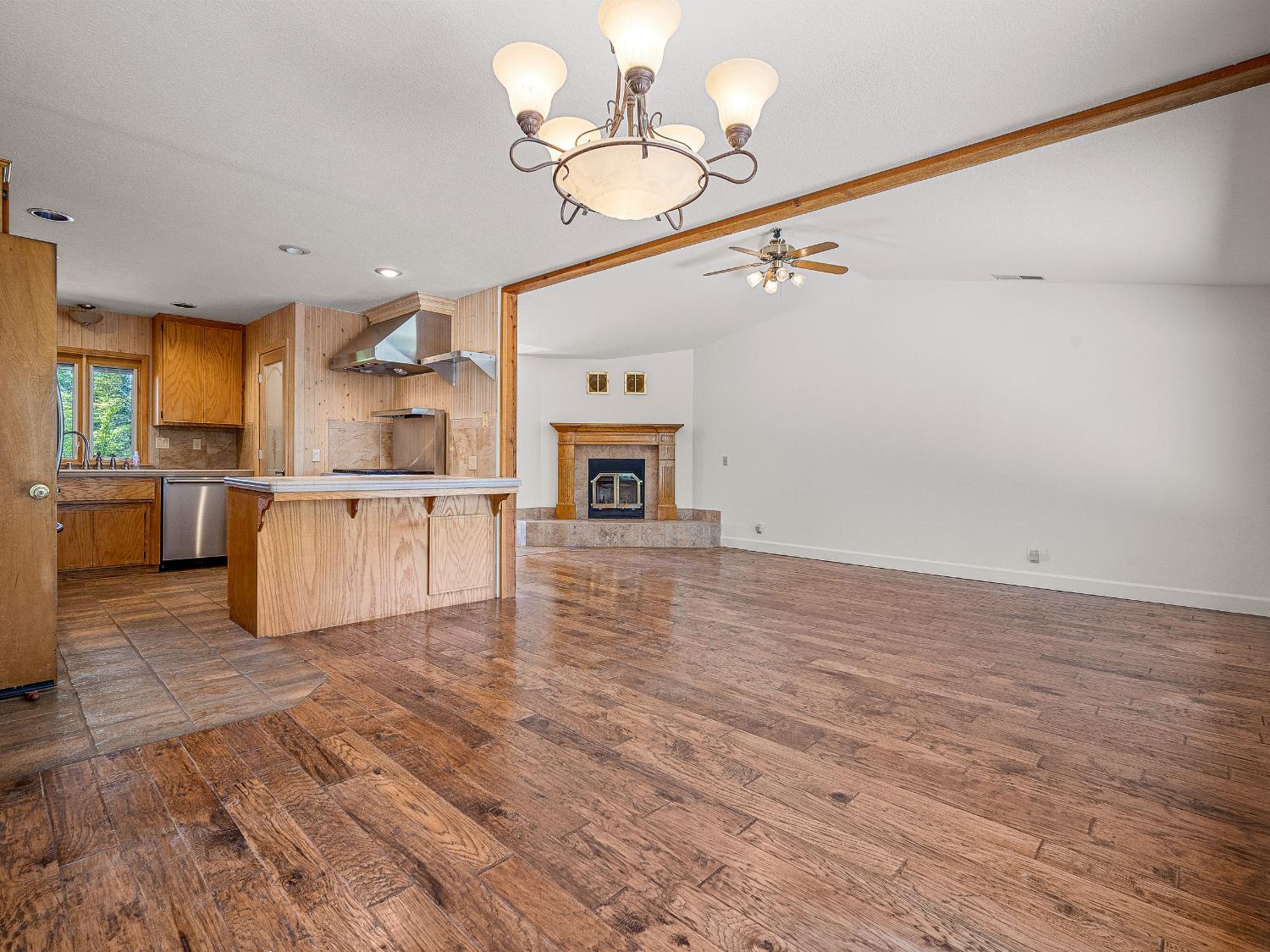 6460 Claim Street Placerville, CA 95667 - Photo 39 of 86 a view of a kitchen with a sink cabinets and wooden floor