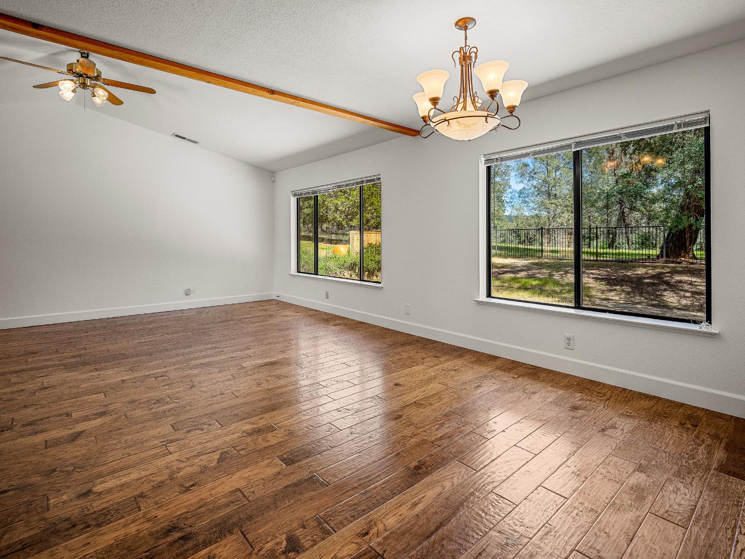 6460 Claim Street Placerville, CA 95667 - Photo 41 of 86 a view of livingroom with window wooden floor and windows