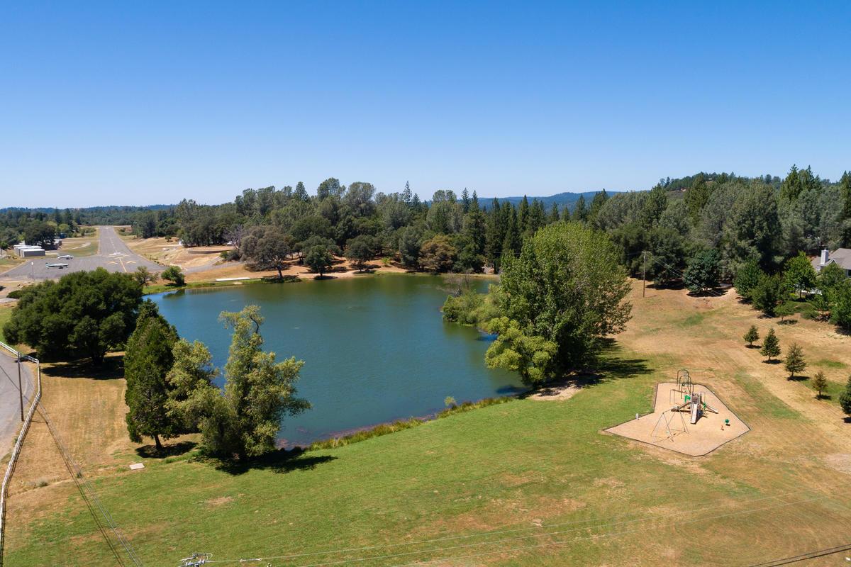 6460 Claim Street Placerville, CA 95667 - Photo 64 of 86 a view of a lake with a yard