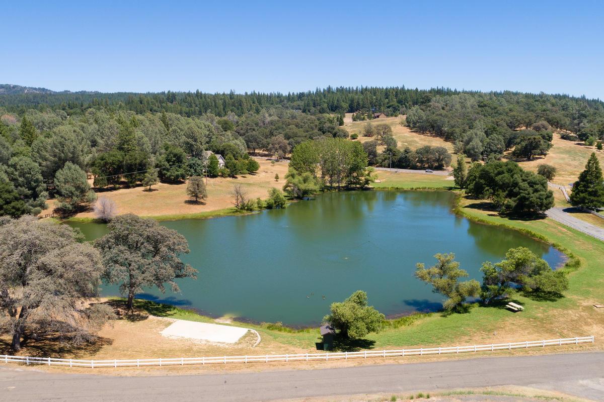 6460 Claim Street Placerville, CA 95667 - Photo 72 of 86 a view of a lake with a mountain