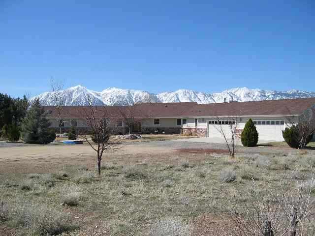 1530 Lombardy Road Gardnerville, NV 89410 - Photo 1 of 3 a view of a house with a yard