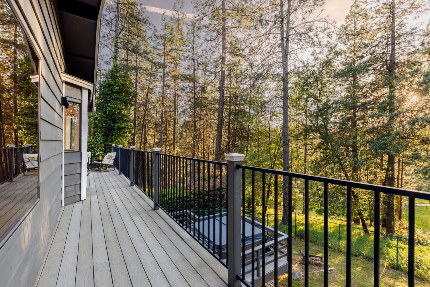 17082 Alioto Drive Grass Valley, CA 95949 - Photo 16 of 42 Composite deck wraps around the back of the home