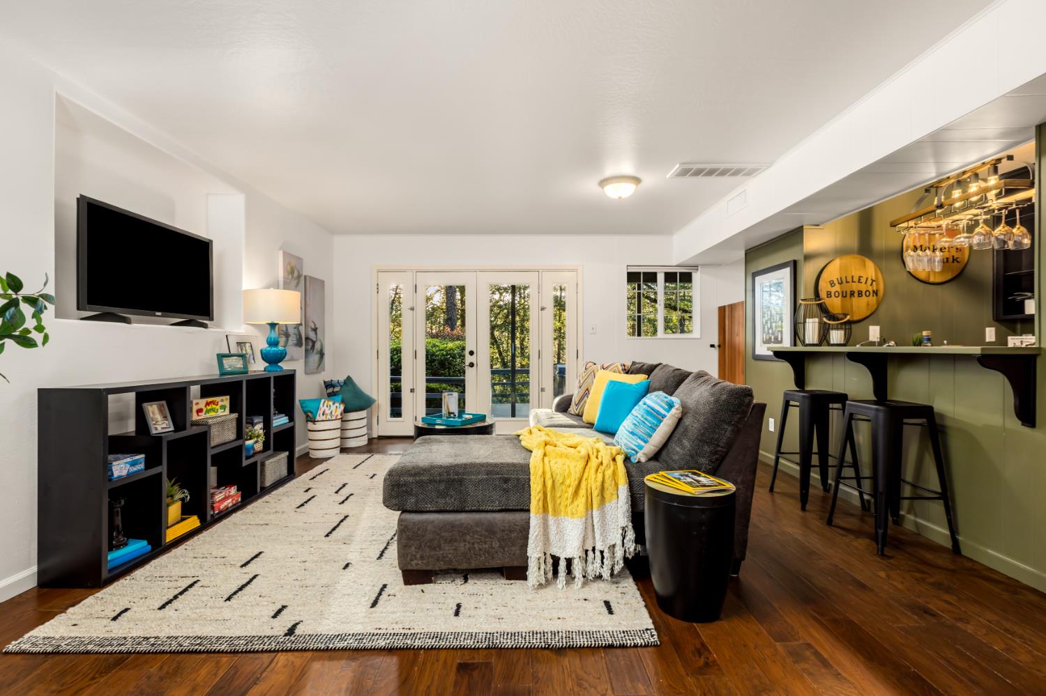 17082 Alioto Drive Grass Valley, CA 95949 - Photo 29 of 42 French glass doors out to fenced back yard with hot tub, pool and lawn area