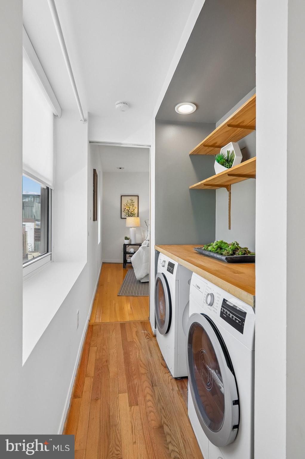 2370 Champlain Street Northwest, Unit 35 Washington, DC 20009 - Photo 25 of 49 a view of livingroom with washer and dryer