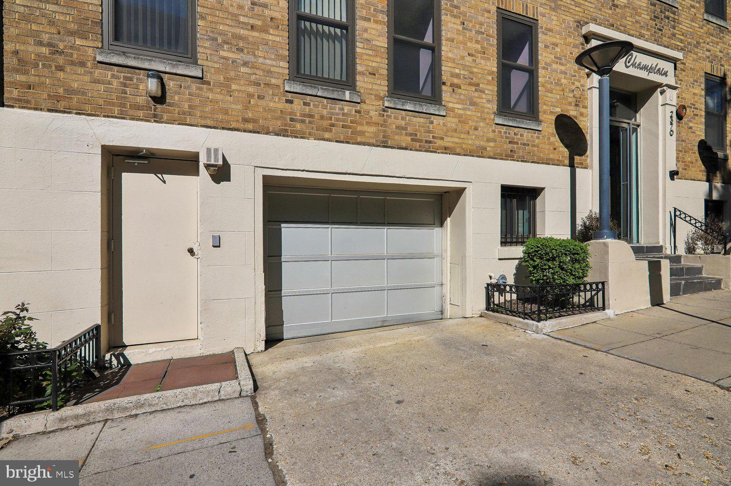 2370 Champlain Street Northwest, Unit 35 Washington, DC 20009 - Photo 4 of 49 a view of a house with garage