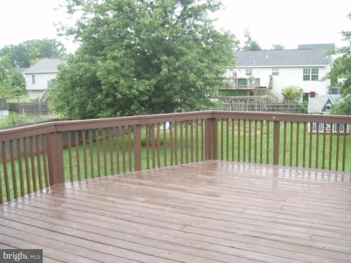 89 Cottontail Court Ranson, WV 25438 - Photo 2 of 9 a view of balcony with wooden floor