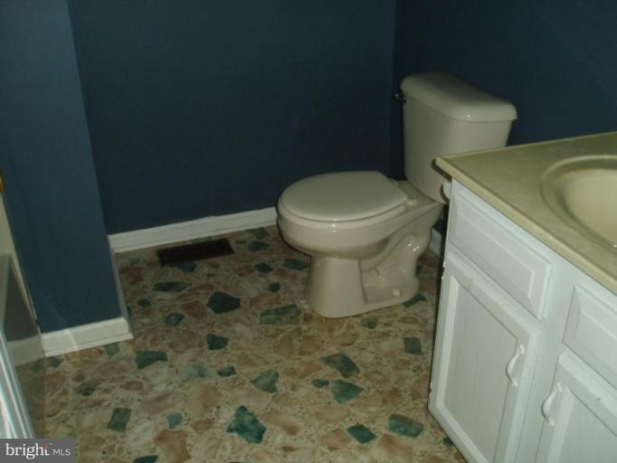 89 Cottontail Court Ranson, WV 25438 - Photo 6 of 9 a bathroom with a sink and toilet