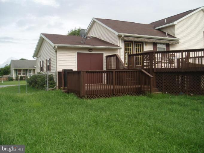 89 Cottontail Court Ranson, WV 25438 - Photo 7 of 9 a view of backyard with deck