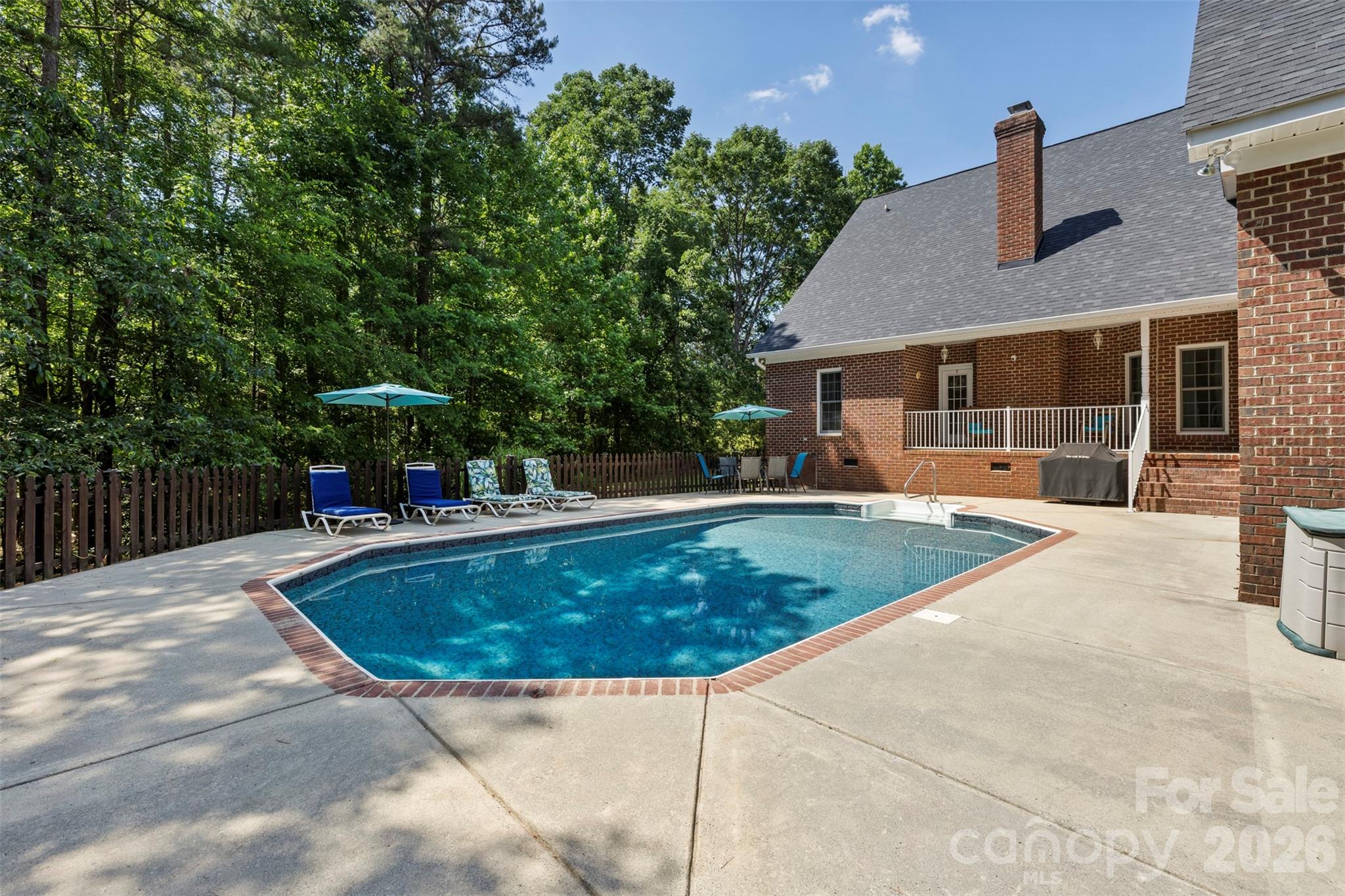 710 Sleepy Hollow Road Midland, NC 28107 - Photo 25 of 29 a view of outdoor space yard swimming pool and patio
