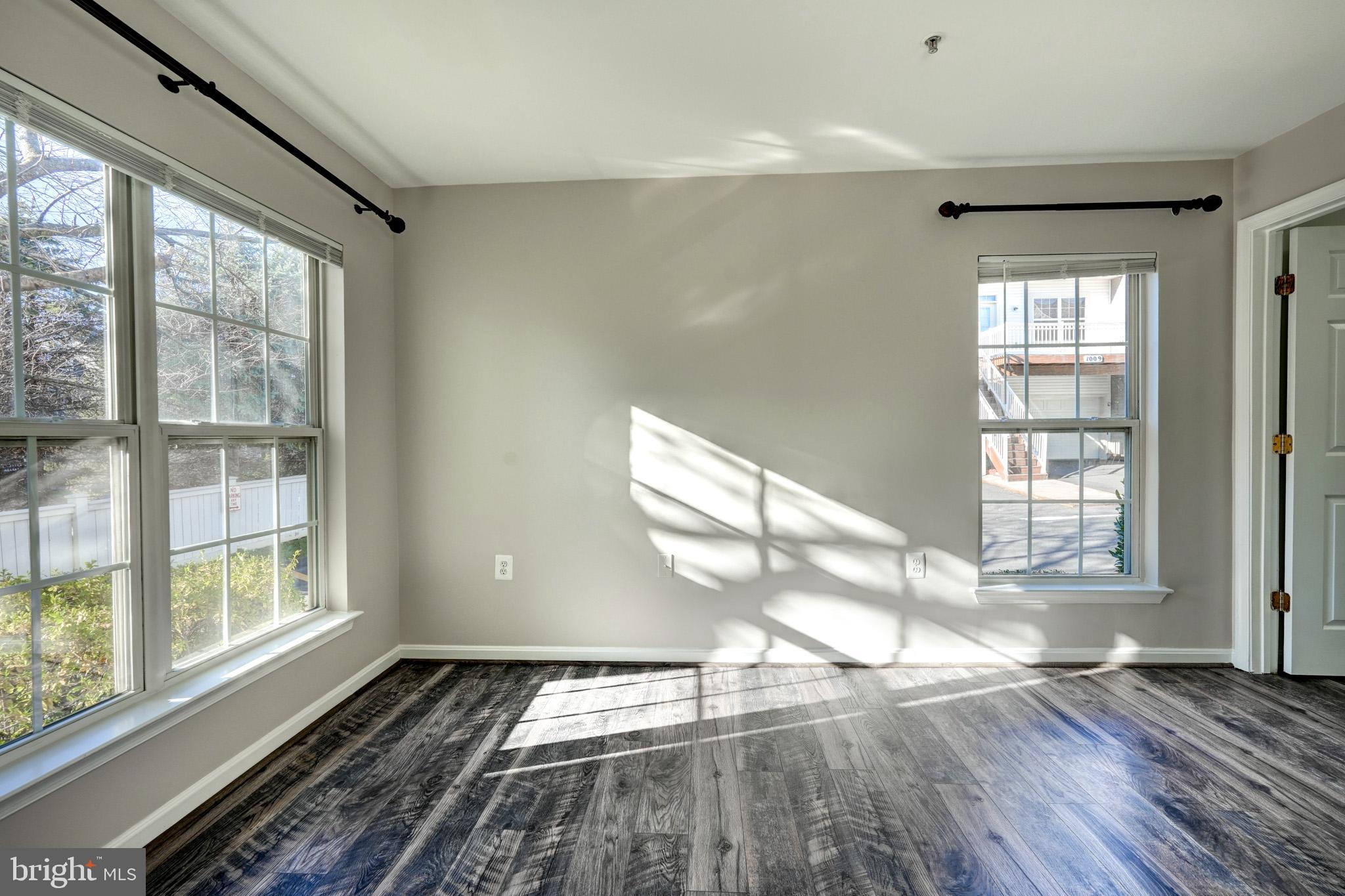 1001 Gaither Road, Unit I Rockville, MD 20850 - Photo 21 of 34 a view of an empty room and window