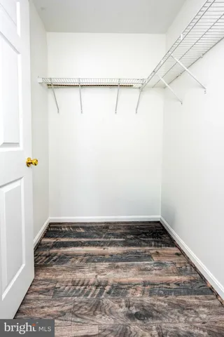 a view of a room with racks on the wall