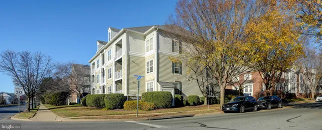 a view of a building with a street