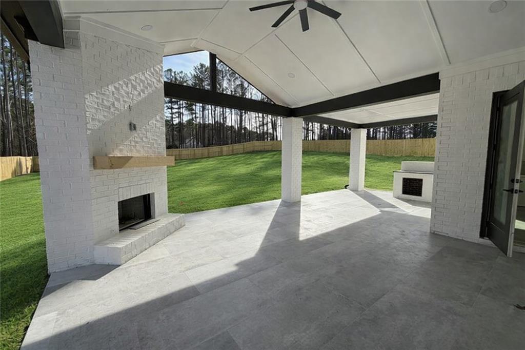 2596 Camp Mitchell Road Grayson, GA 30017 - Photo 15 of 19 a view of an entryway with floor to ceiling window