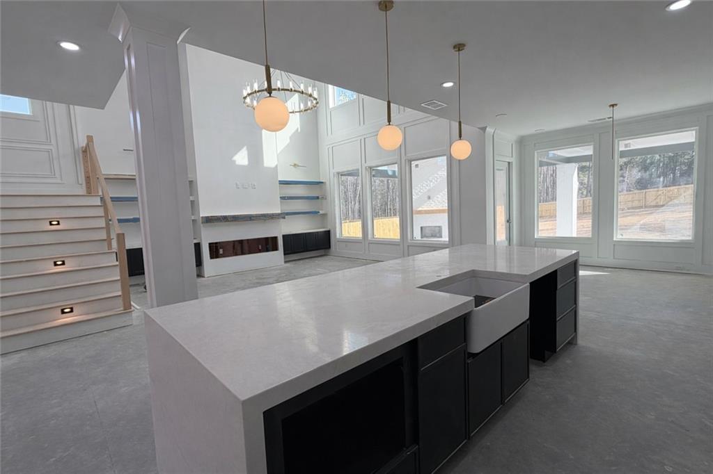 2596 Camp Mitchell Road Grayson, GA 30017 - Photo 5 of 19 a kitchen with a table chairs and window