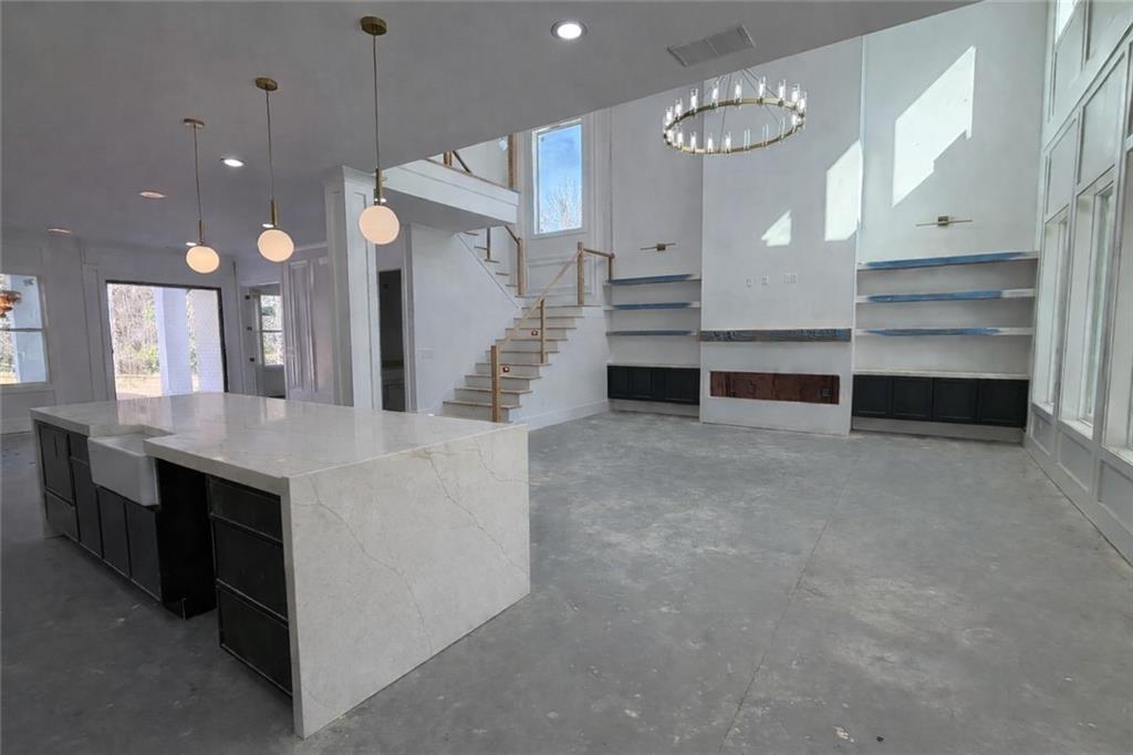 2596 Camp Mitchell Road Grayson, GA 30017 - Photo 6 of 19 a view of kitchen with cabinets and window