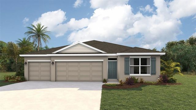 a front view of a house with a garden and yard