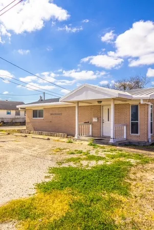 a view of a house with a swimming pool