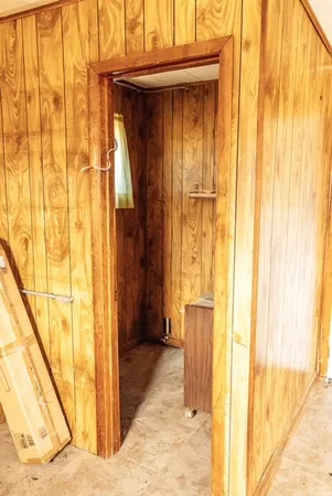 a view of a bathroom with a tub and shower