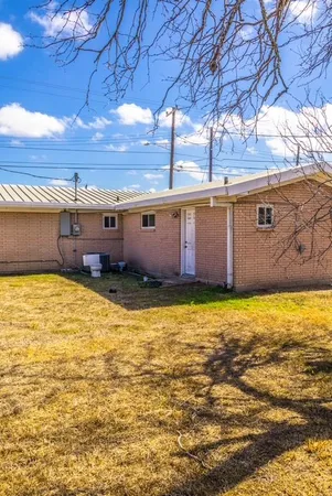a view of a pool with an outdoor space
