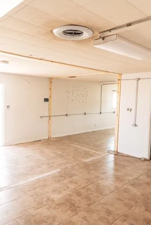 a view of a room with an empty space