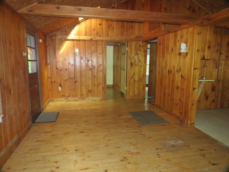 91 Coffee Pond Road Casco, ME 04015 - Photo 16 of 35 Large living room. Door to left...