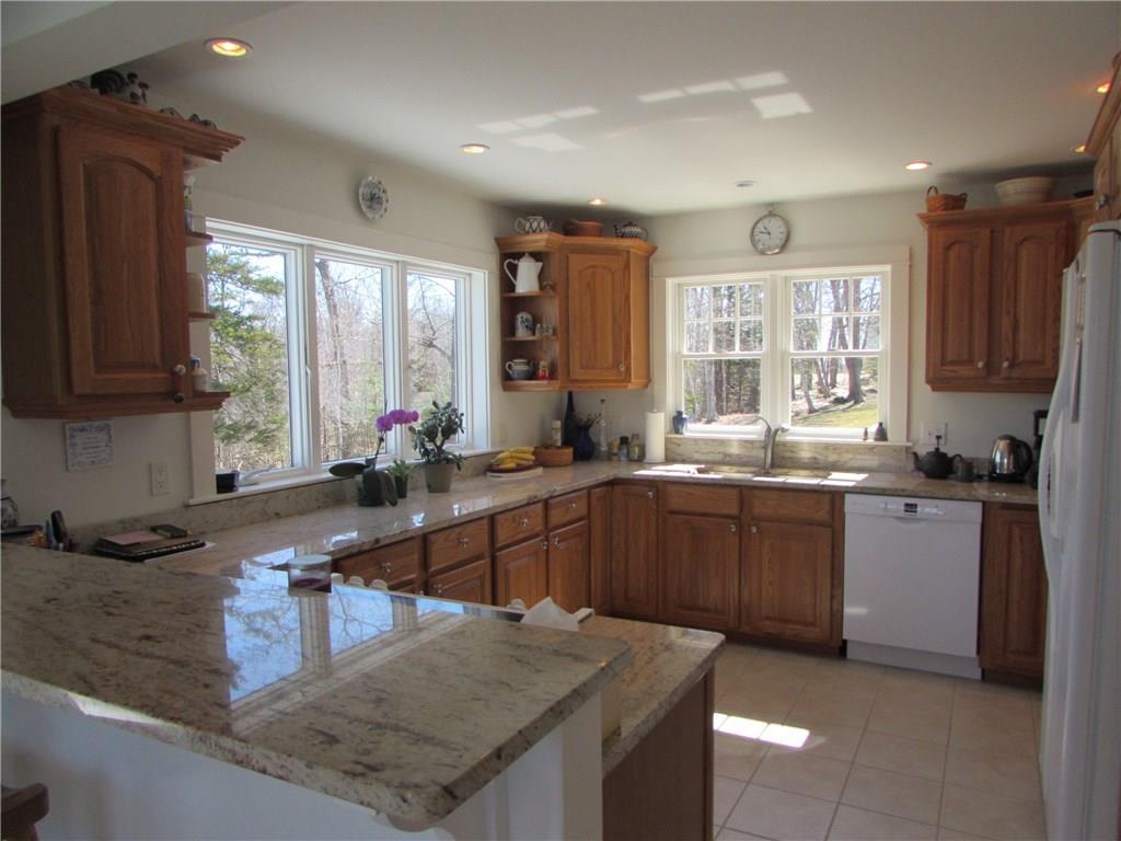 36 Hatch Cove Drive Castine, ME 04421 - Photo 7 of 28 View of kitchen looking east toward...