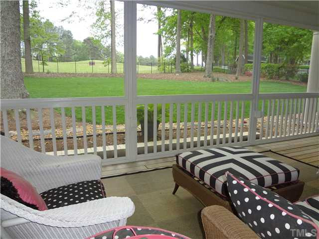 1604 Hunting Ridge Road Raleigh, NC 27615 - Photo 23 of 25 Welcome To The 19th Hole!!. The Screened Porch Will Be One Of Your Favorite Spaces To Entertain Family And Friends!!! Or Simply Enjoy The View With A Tall Ice Tea And A Good Book. Screened Porch