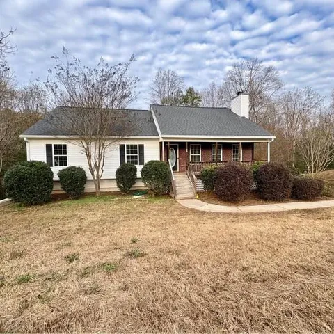 front view of a house with a yard