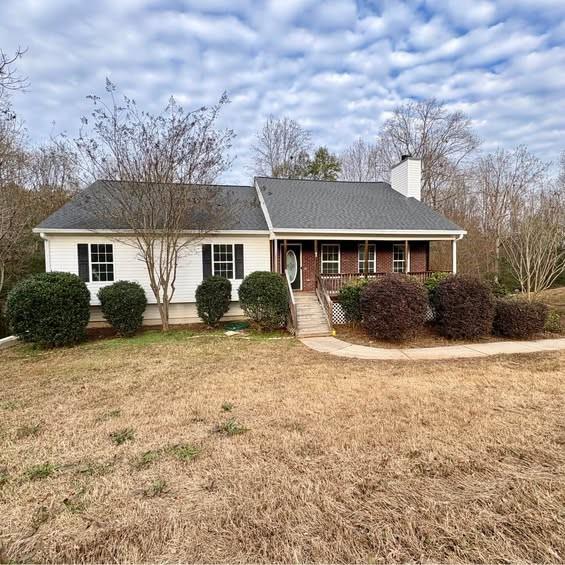 front view of a house with a yard