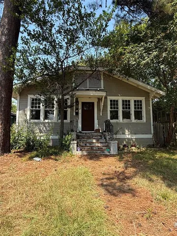 front view of a house with yard