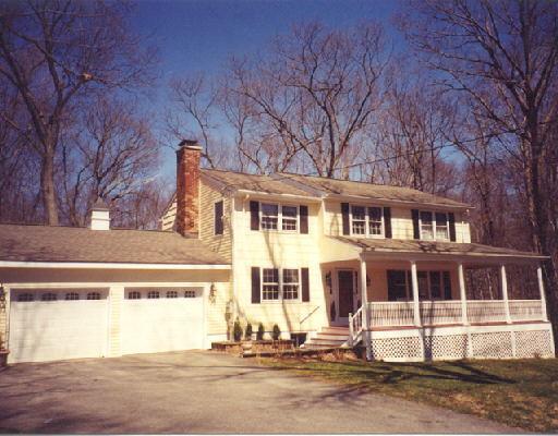 31 Arapaho Road Brookfield, CT 06804 - Photo 1 of 1 a front view of a house with a yard